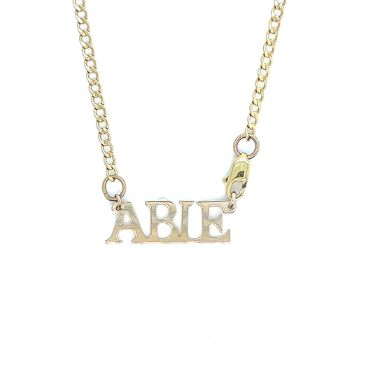 All Capital Gold Nameplate Pendant